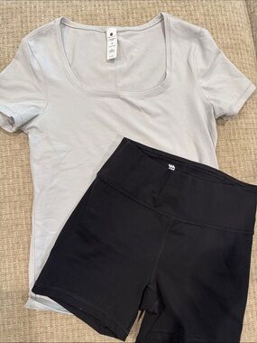 Yogalicious Light Gray Scoop Neck Top and biker short set.